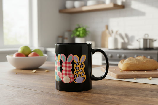 Easter Bunny Row Black Ceramic Mug — Colorful Patterned Bunny Silhouettes (11oz & 15oz)